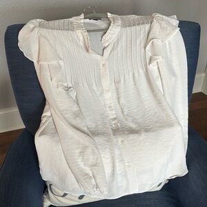 Beautiful feminine off-white peasant-style blouse. Long sleeved.